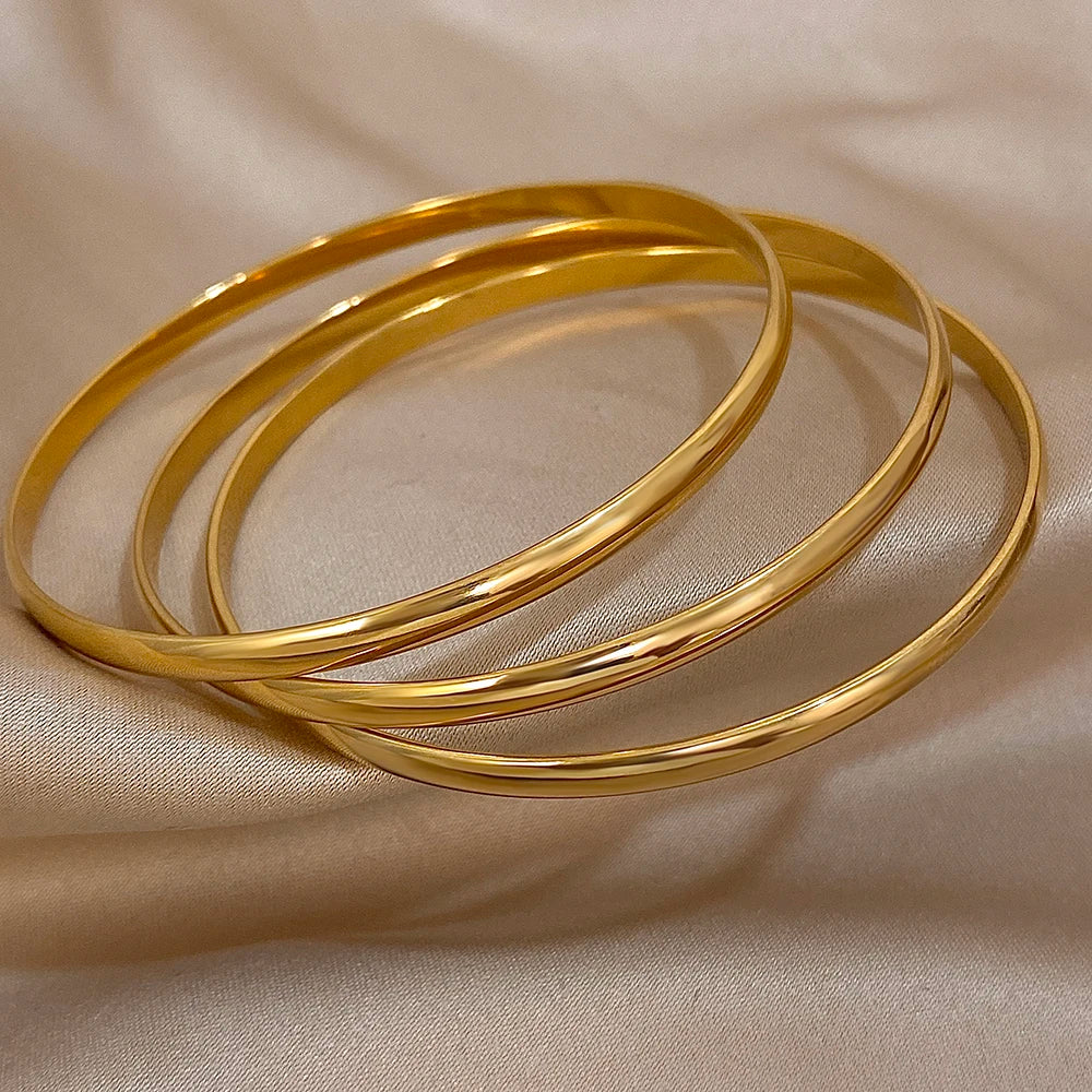 Lot de 3 bracelets joncs dorés